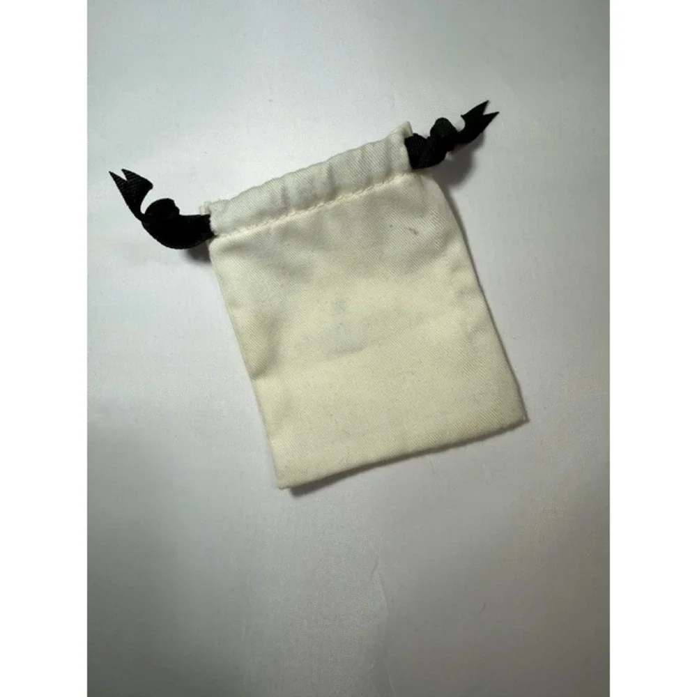 Kate Spade New York Small Canvas Jewelry Drawstring Pouch Bag Off White Black